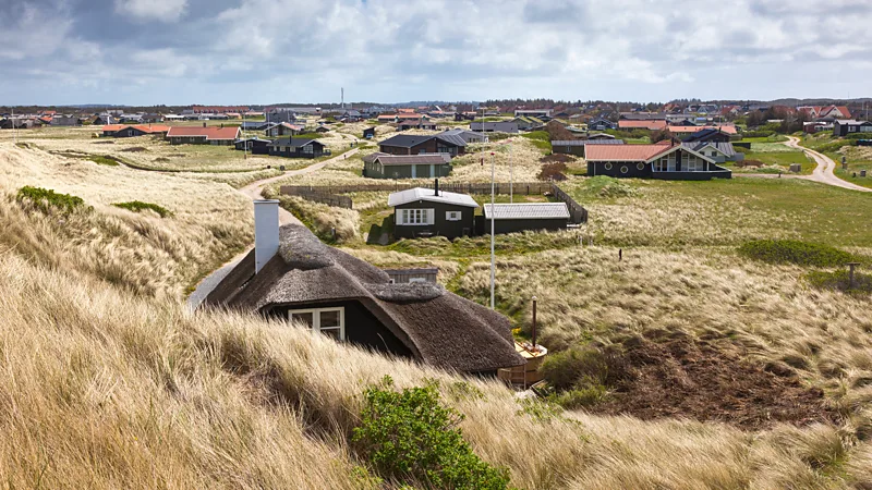 The houses in Klitmøller are nestled among the dunes 